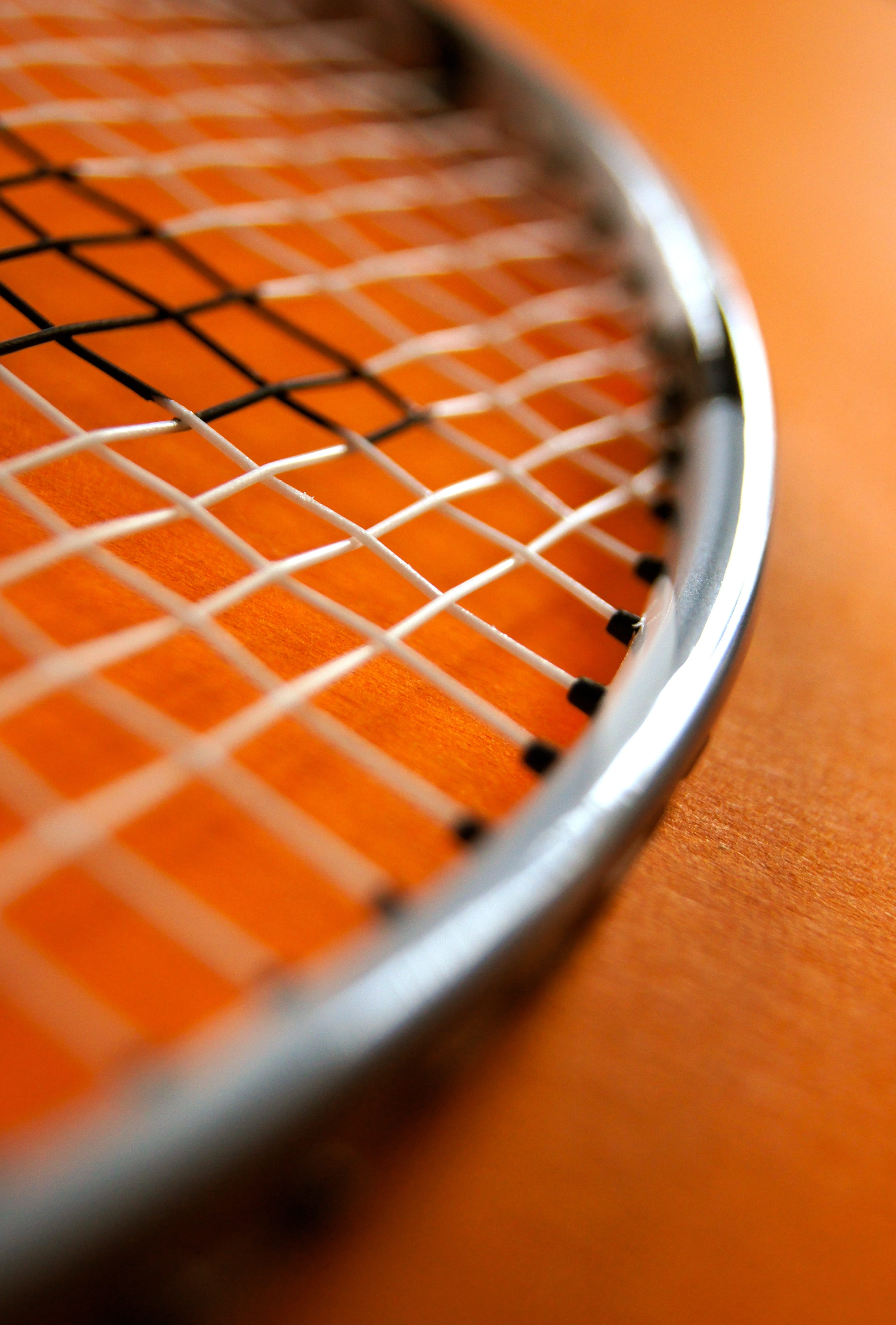 macro lens photography of metal racket sport badminton bat 2k