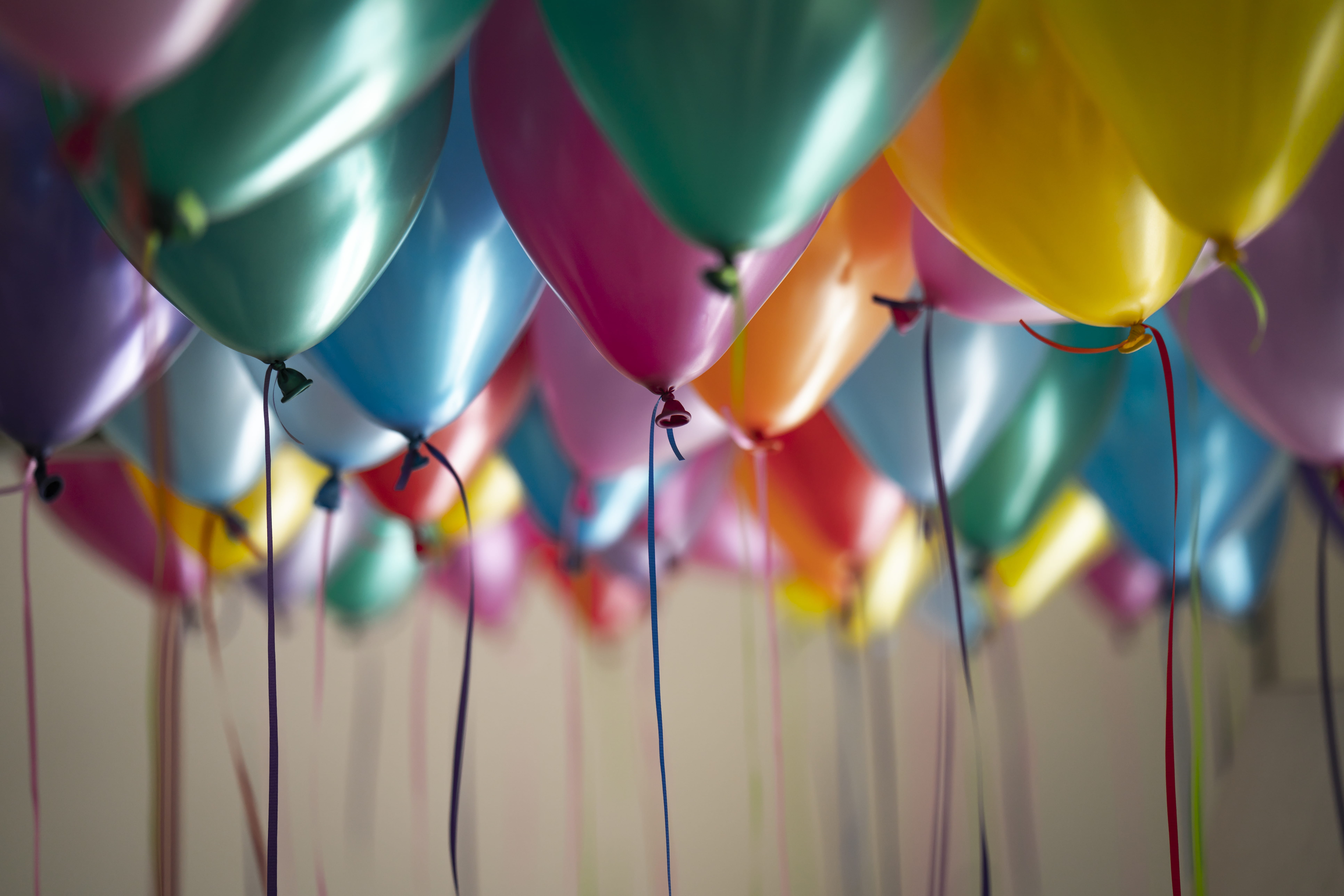 selective focus photography of assorted color balloons birthday 2k 4k 5k 8k