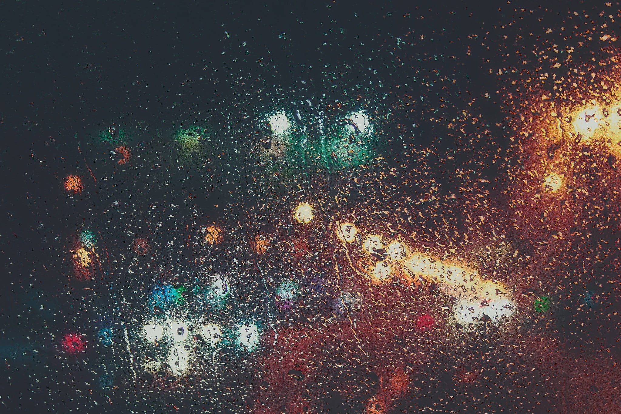 assorted color light bokeh window water drops wet glass material 2k