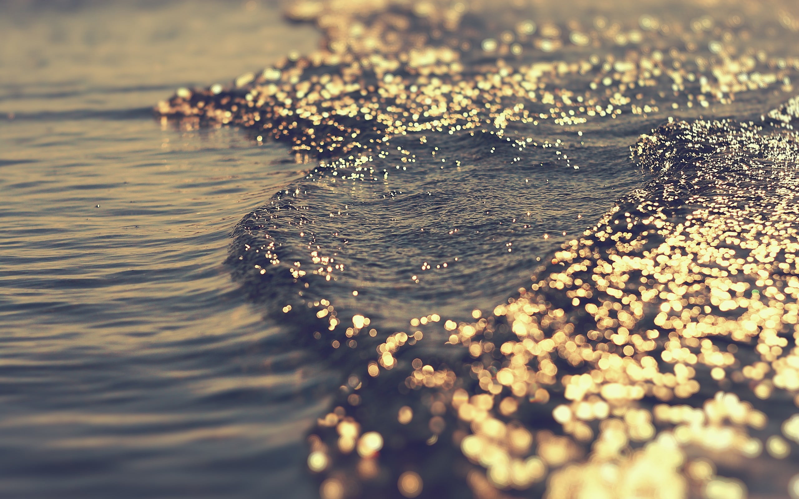 body of water close up photo sea wave bokeh waves sunlight 2k