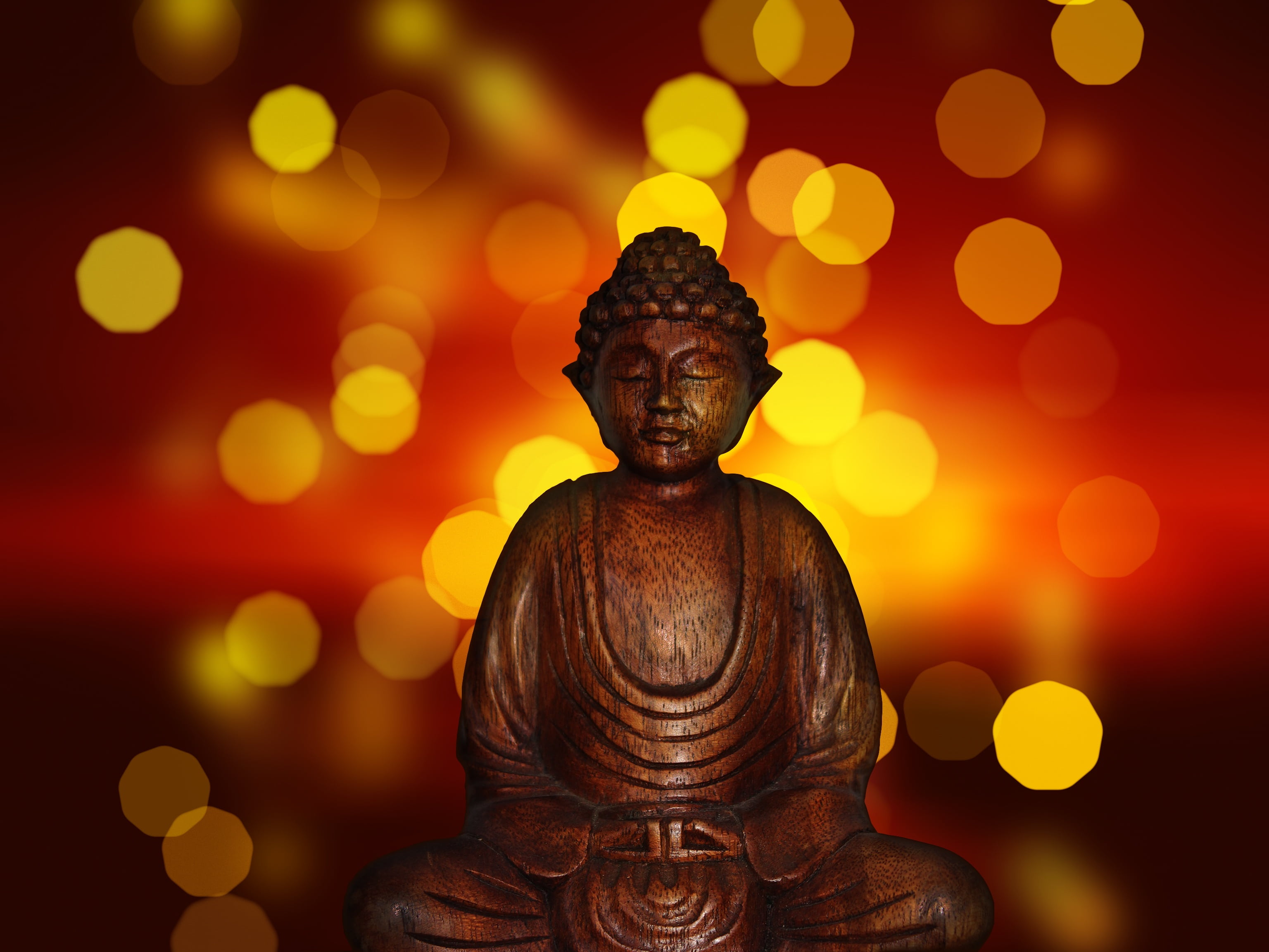 bokeh photography of Gautama Buddha buddhism statue religion 2k