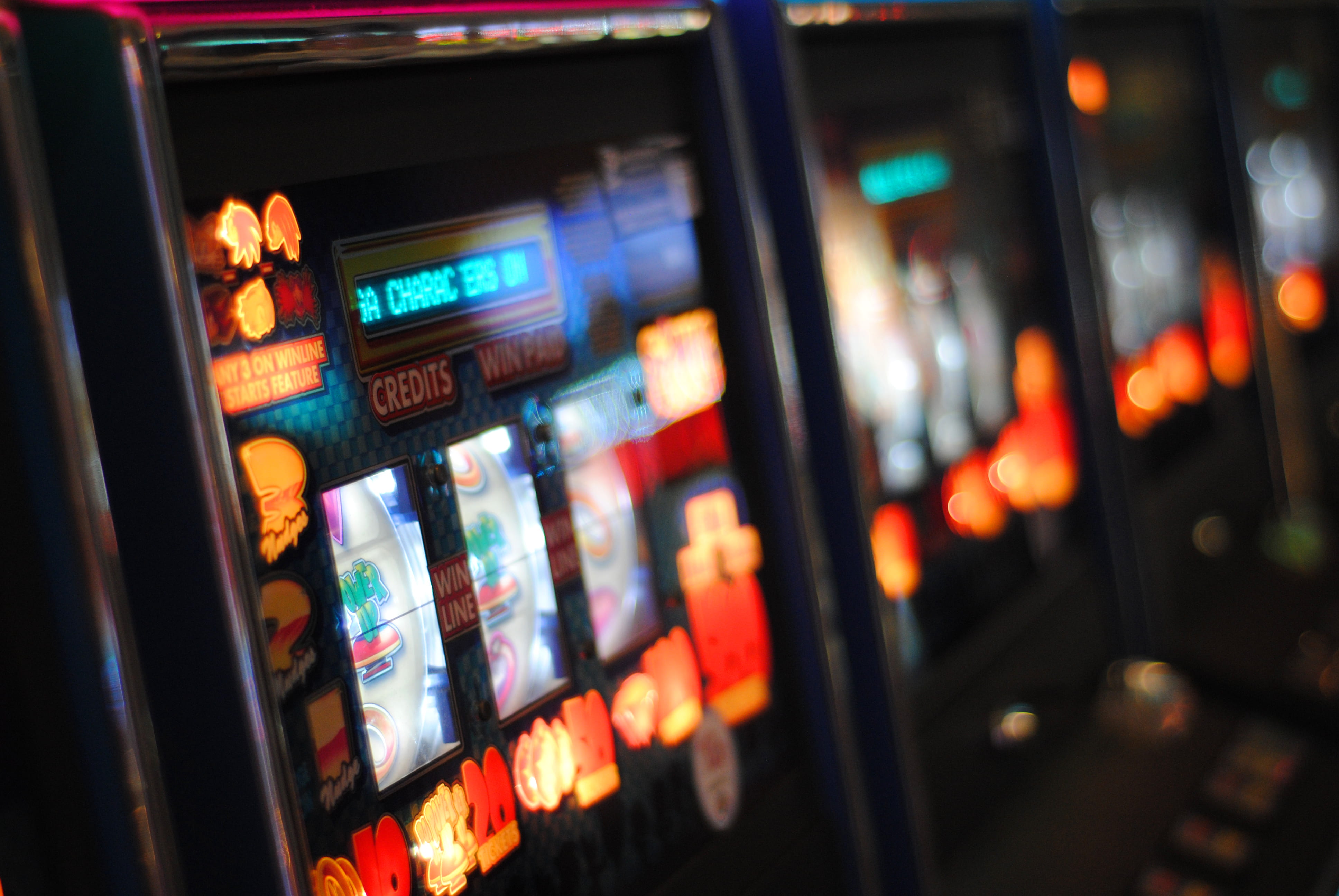 slot machine bokeh photography of gambling play 2k 4k