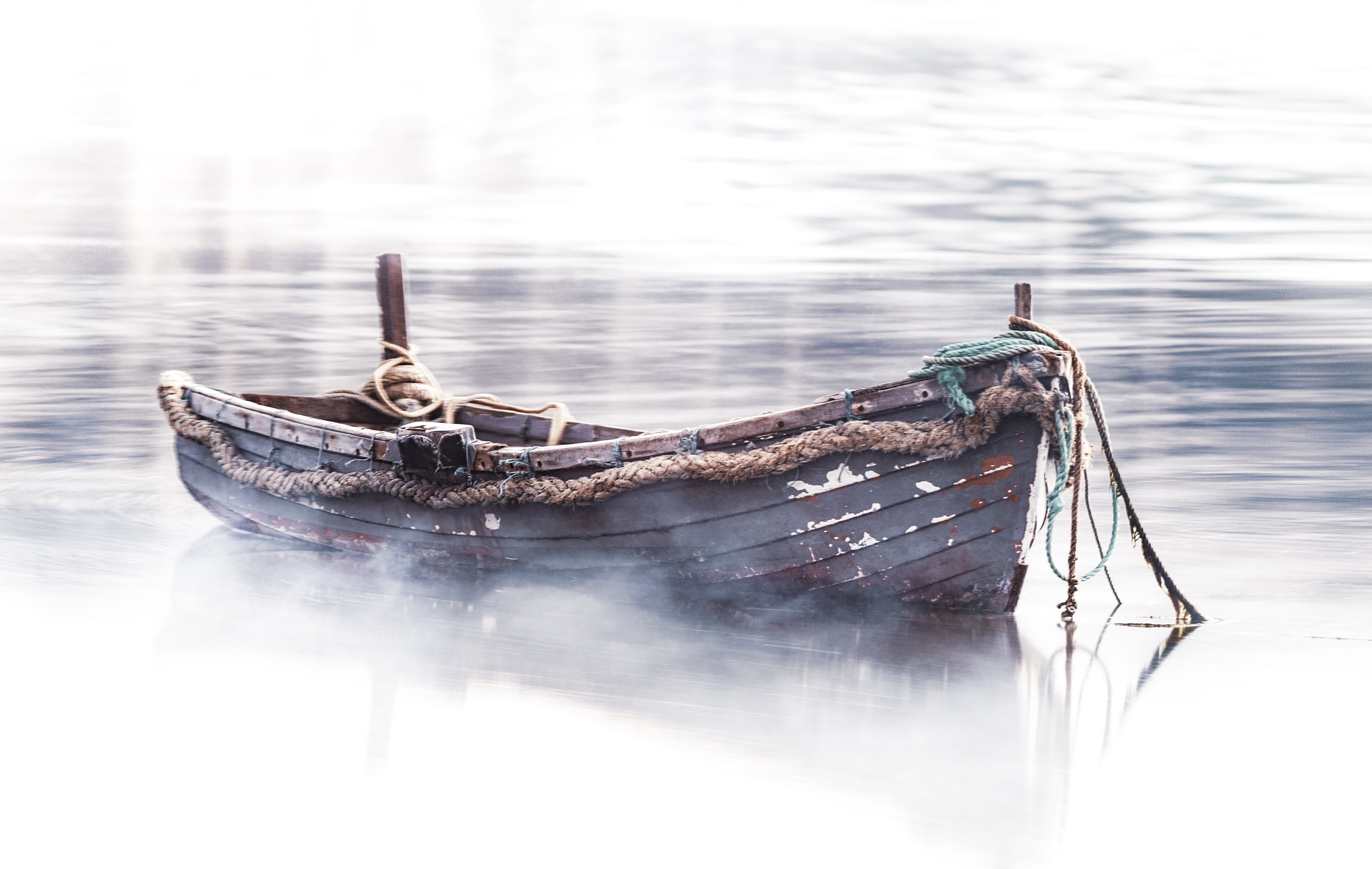 empty brown boat on body of water photo canoe 2k 4k 5k