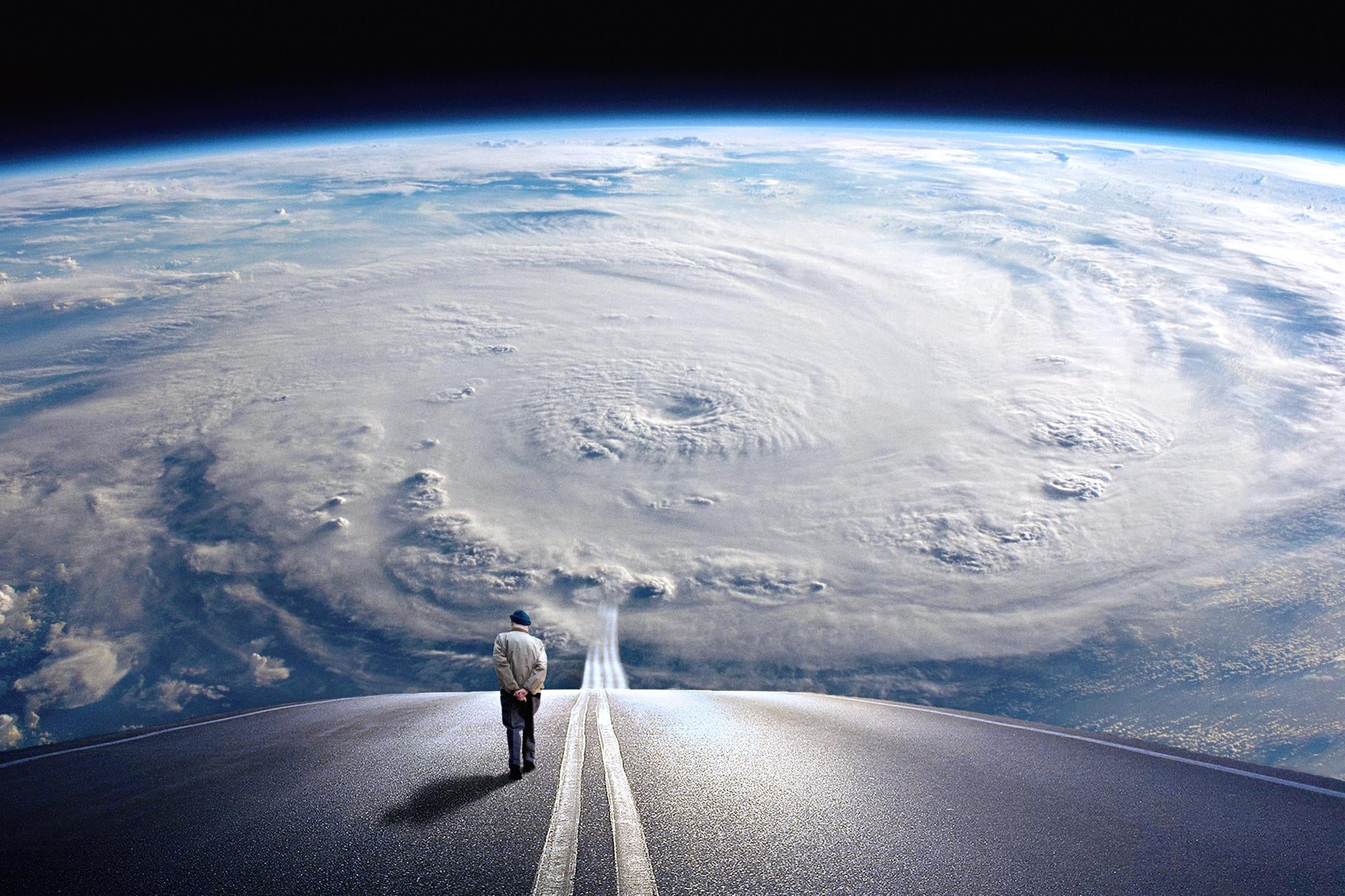 person walking on road background of earth When Breath Becomes Air 2k
