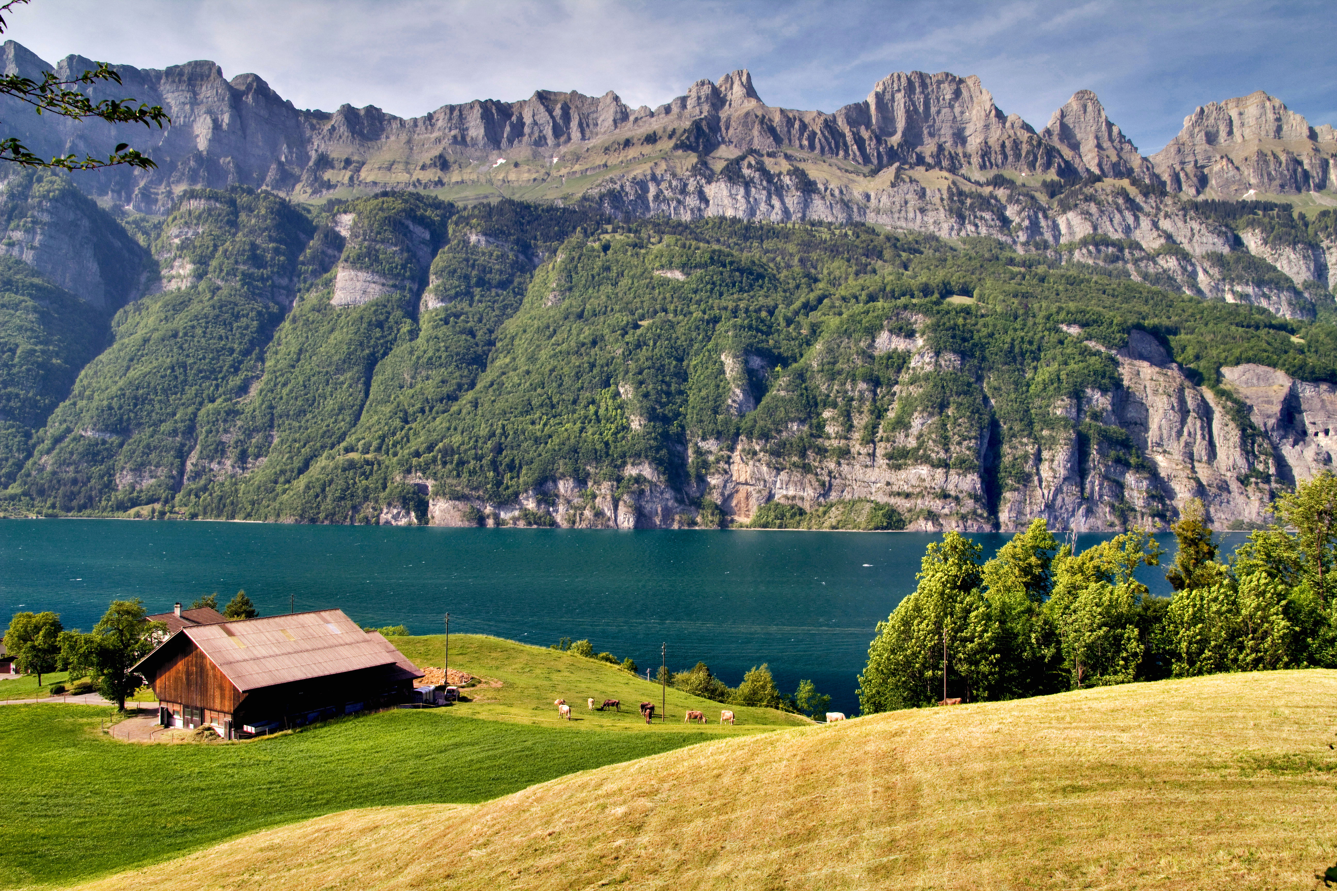 house and lake with mountain in distance on landscape photography 2k 4k 5k