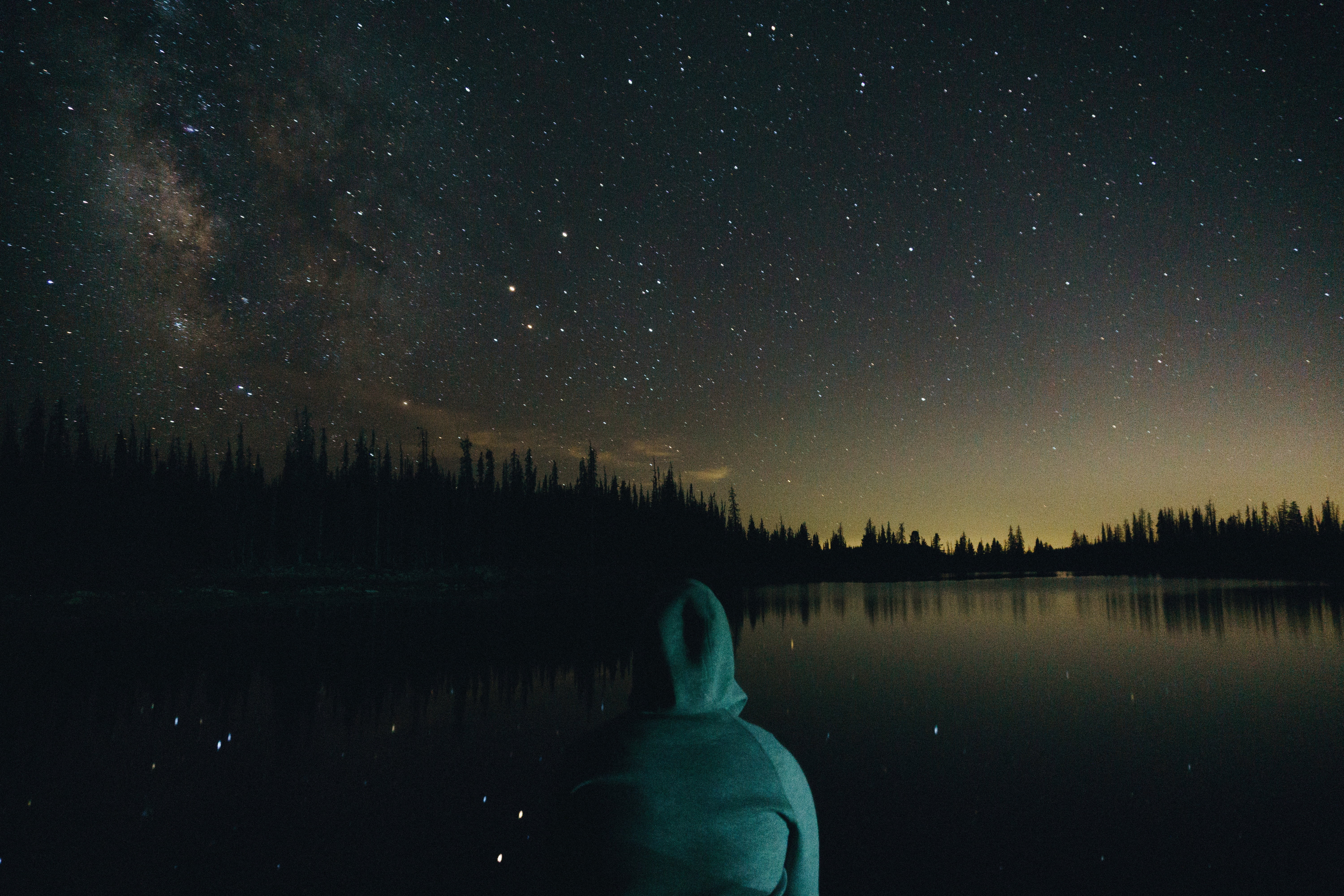person wearing hoodie looking at nebula teal night time dark 2k 4k 5k