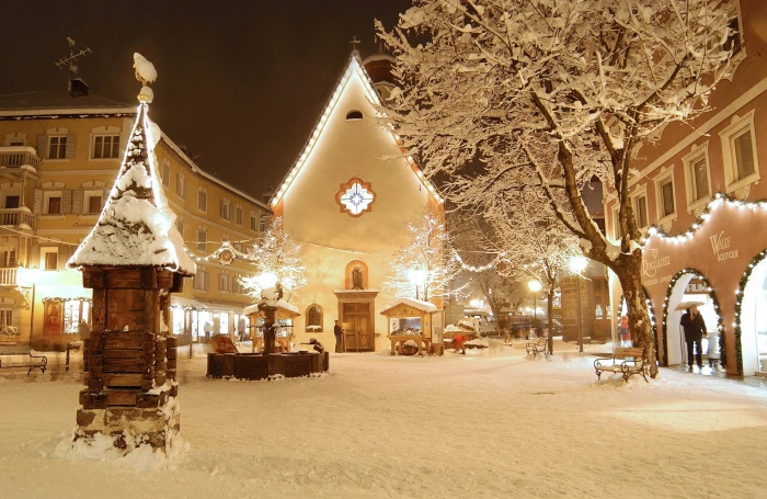 white concrete building Christmas snow winter night tree 2k 4k