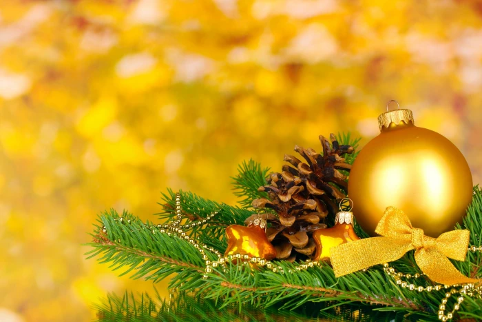 gold Christmas bauble yellow background holiday balls Wallpaper 2k 4k 5k