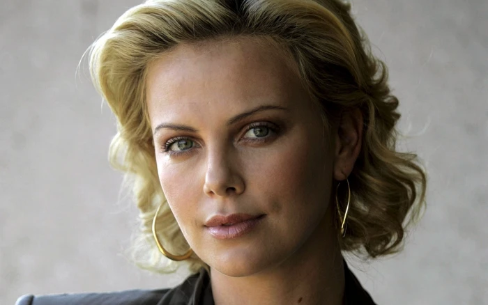 Actresses Charlize Theron Blonde Earrings Face Green Eyes