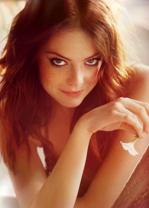 actress Emma Stone redhead portrait display looking at viewer