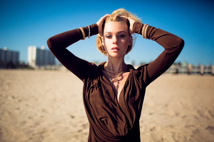 Nicola Peltz actress celebrity hands on head women outdoors 2k