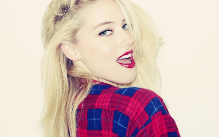 Amber Heard open mouth actress face looking back at viewer