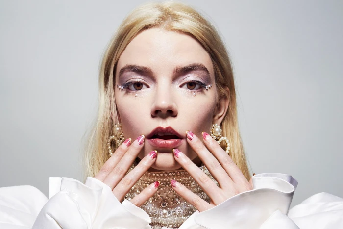Anya Taylor Joy blonde women face painted nails simple background 44 2k