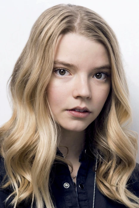 Anya Taylor Joy blonde women face simple background actress