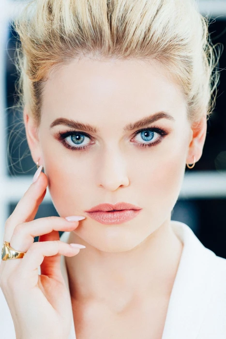 gold colored ring Alice Eve actress blue eyes green
