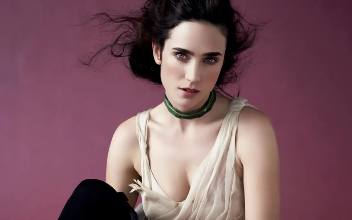 Jennifer Connelly Thinking women's white sleeveless top and green collar necklace