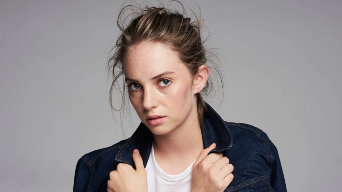 Maya Hawke actress looking at viewer simple background 2k 4k
