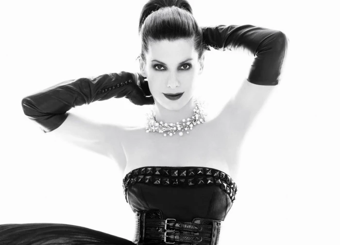 Sandra Bullock monochrome actress ponytail black gloves