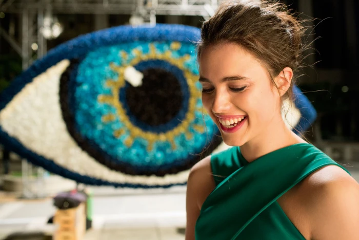 women actress Margaret Qualley green dress laughing brunette