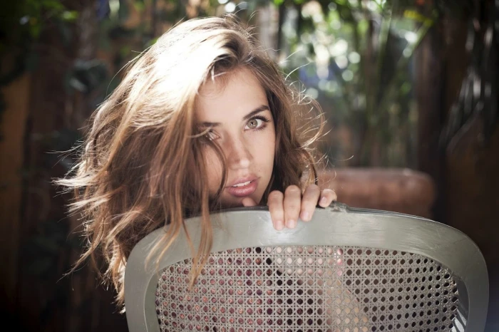 women Ana de Armas Cuba hazel eyes hair in face chair