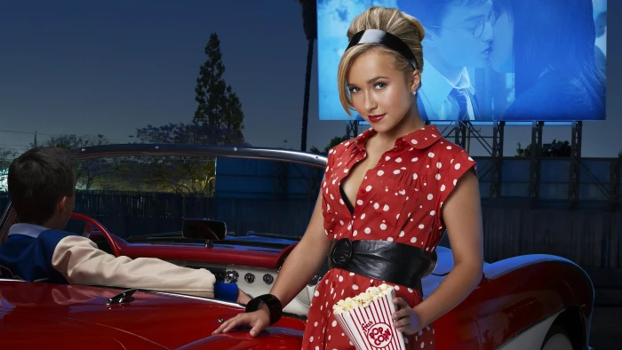 woman wearing red and white polka dot sleeveless dress actress 2k