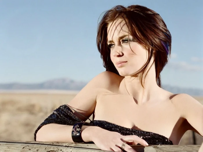 women's black off shoulder top Emily Blunt actress one person