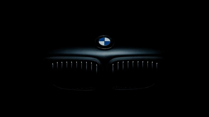 car logo BMW dark indoors no people studio shot black background 2k