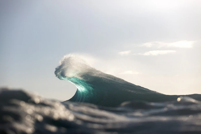 blue water wave ocean waves during daytime sea macro bokeh 2k