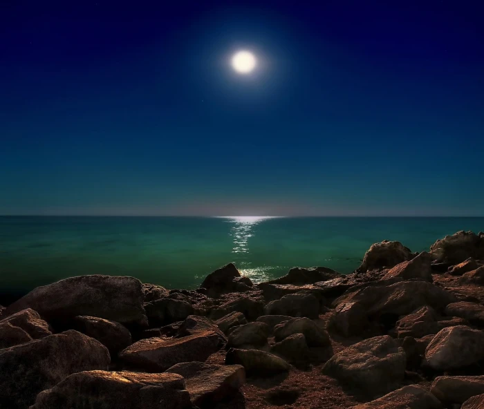 brown rock lot landscape nature photography rocks sea Moon 2k