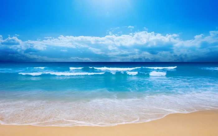 ocean and white clouds beach sky nature sea waves horizon