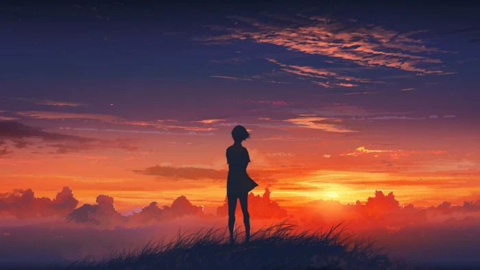 person standing on top of mountain during golden hour wallpaper 2k