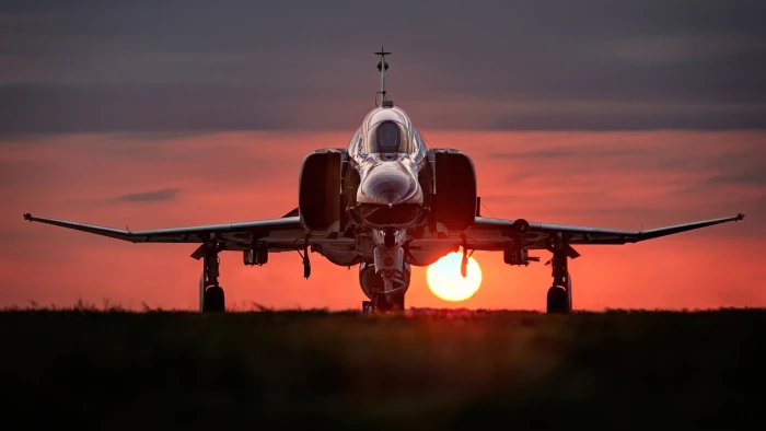 photography of jet plane during dawn fighter F 4 Phantom II 2k