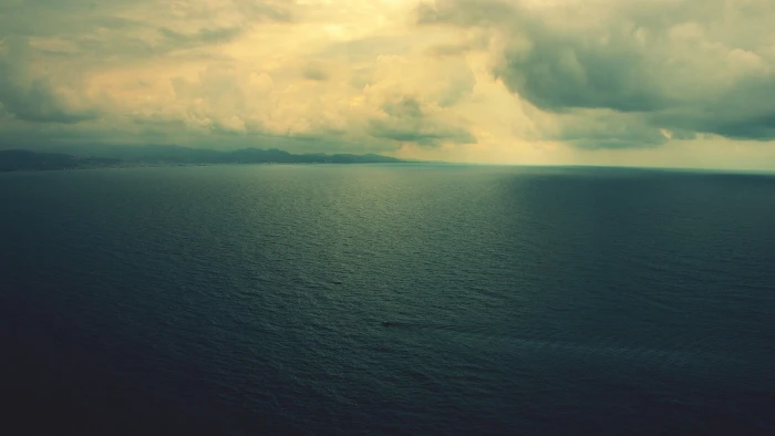 blue sk photography of sea under clouds sky nature aerial view 2k