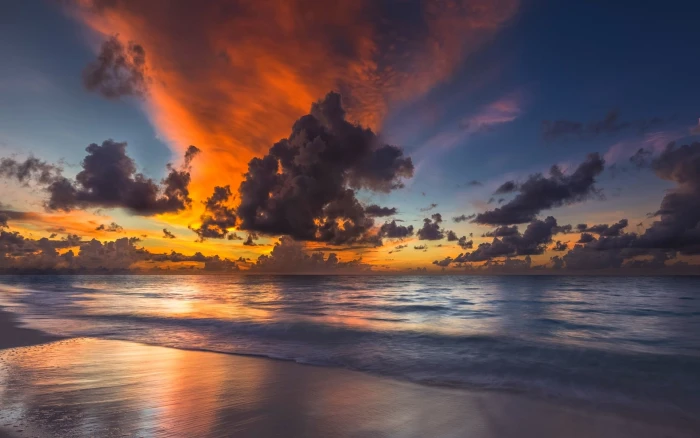 body of water and cloudy sky nature sunset beach Maldives 2k