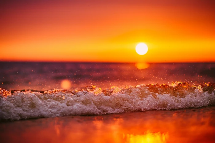 body of water waves sunset beach tilt shift sea dusk nature 2k