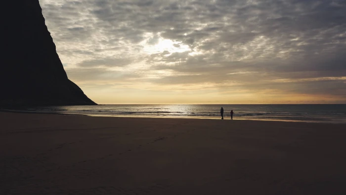 brown wooden framed glass top table sea beach water sky land 2k