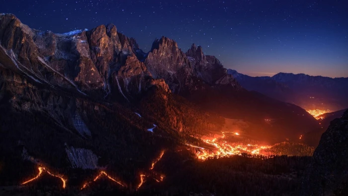 sky nature starry night mountain range city lights 2k