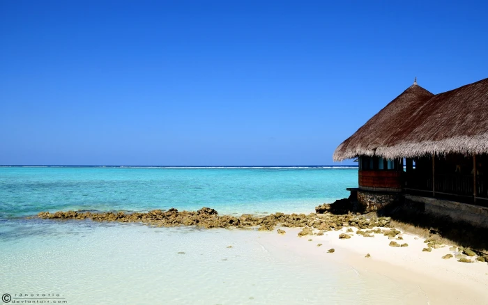 beach sand sea hut sky 2k