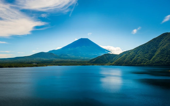 Beautiful blue scenery ocean mountains trees sky 2k