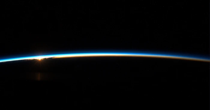 black and blue laptop computer space Earth horizon lens flare 2k 4k