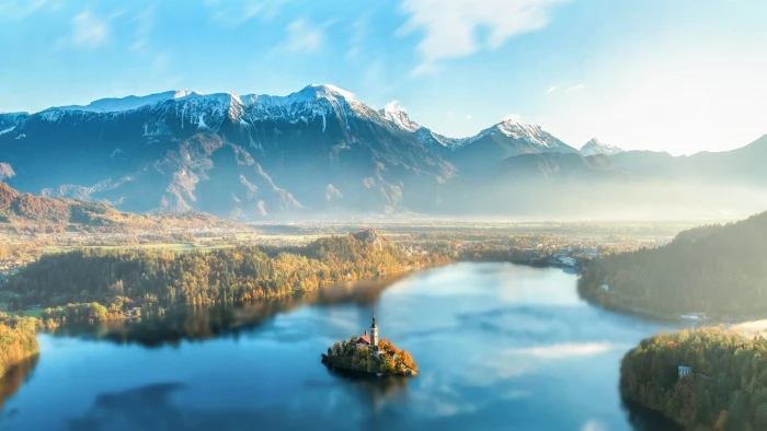 blue body of water landscape photography mountainm snowy peak 2k