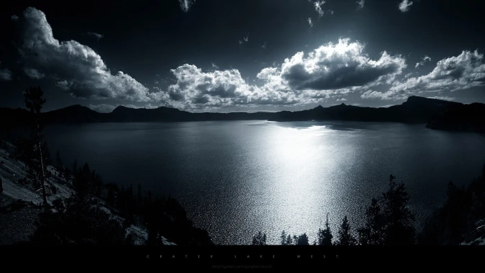 body of water landscape photography surrounded by mountains 2k