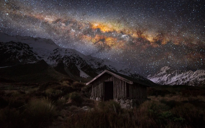 brown wooden house under starry sky wallpaper nature landscape