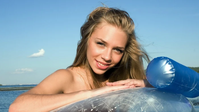 women's blonde hair Liv A water nature beach smiling one person 2k