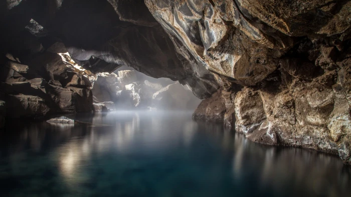 cave with body of water nature landscape rock lake mist 2k