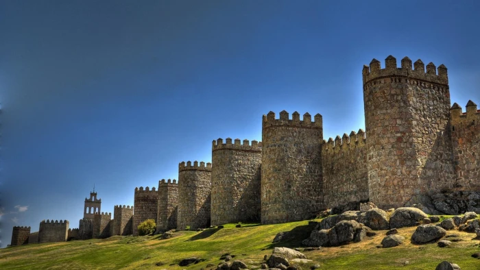 Fortress In Avila Spain brown castle walls towers grass rocks 2k