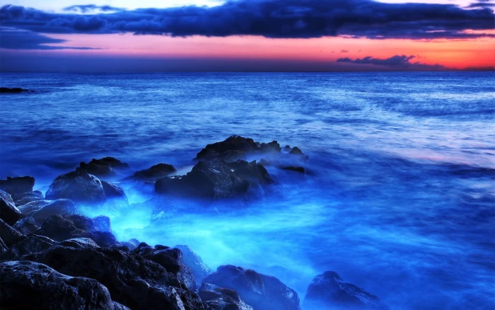 gray rock on body of water beach sea sky nature scenics 2k