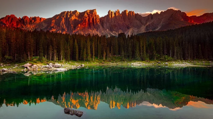 sky dolomites nature reserve reflected forest europe tree 2k