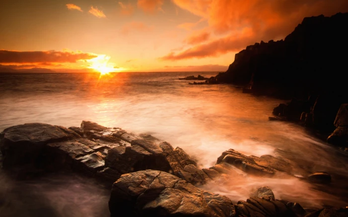 Sunset sea beach rocks stones clouds 2k