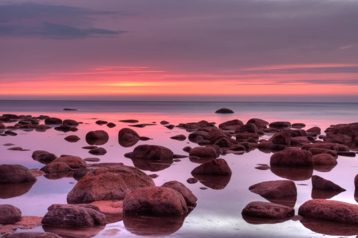 gray rocks in body of water Dawn seashore HDR photomatix 2k